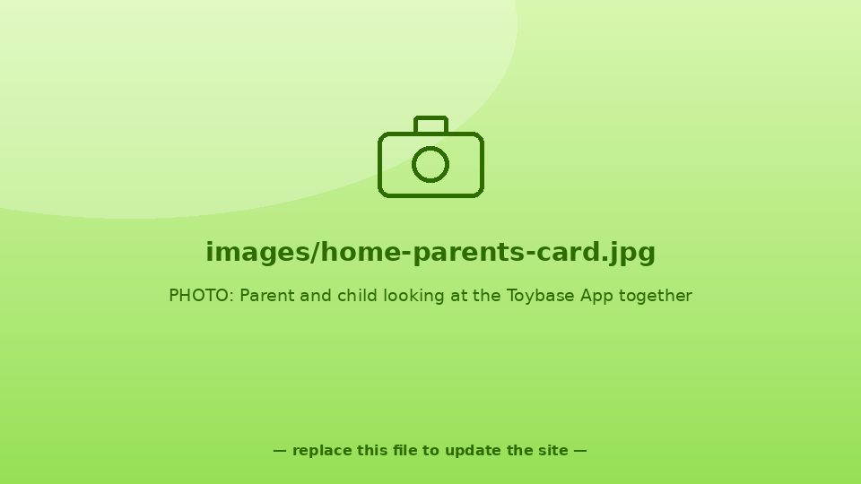 Parent and child looking at the Toybase App together, smiling