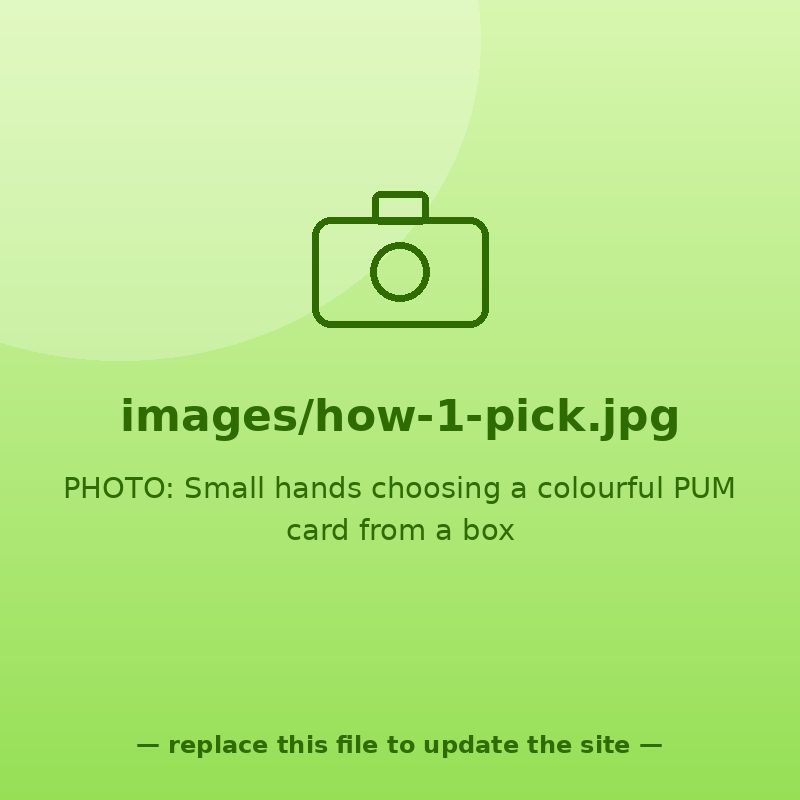 Small hands choosing a colourful PUM card from a box of cards