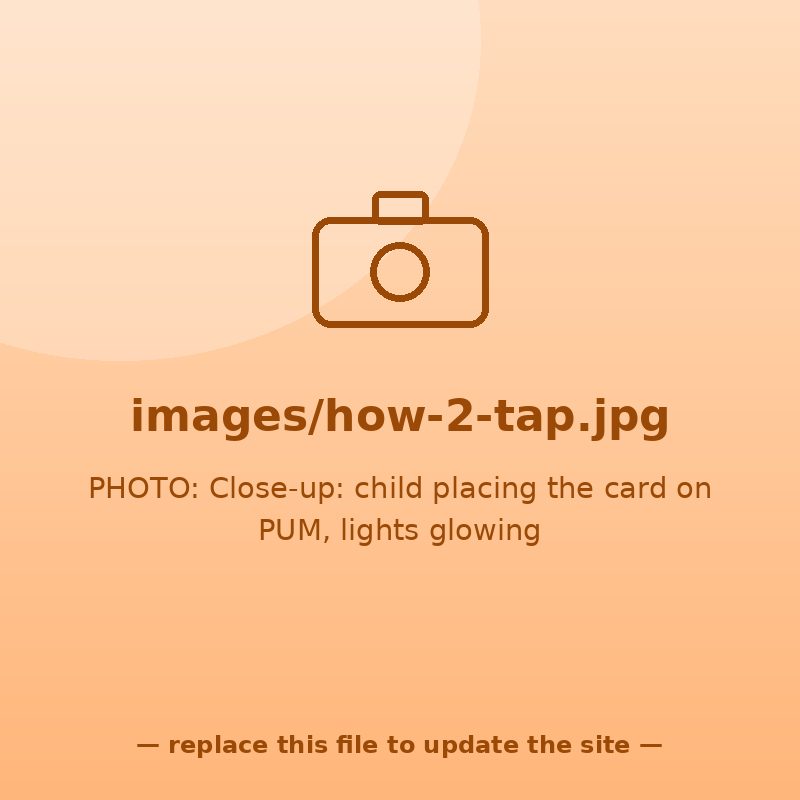 Close-up of a child placing the card on top of PUM, lights glowing